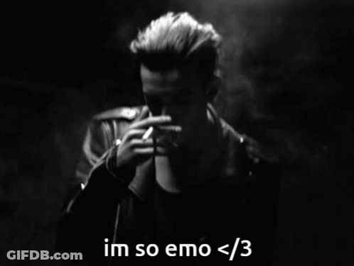 A Black And White Photo Of A Man Smoking A Cigarette With The Caption Im So Emo < 3 GIF