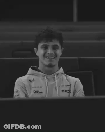 A Black And White Photo Of A Man Wearing A Dell Sweatshirt GIF