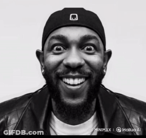 A Black And White Photo Of A Man Wearing A Hat And A Jacket GIF