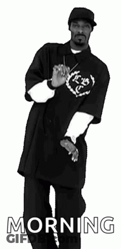 A Black And White Photo Of A Man Wearing A Hat And A Shirt With The Word Morning On It GIF