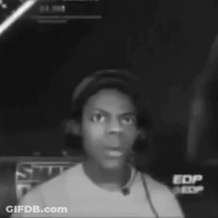 A Black And White Photo Of A Man Wearing A Hat And Headphones . GIF