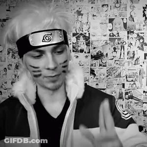 A Black And White Photo Of A Man Wearing A Headband With The Letter N On It GIF