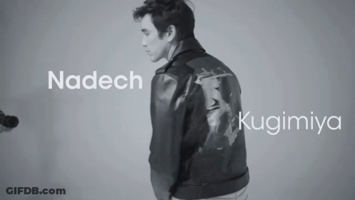 A Black And White Photo Of A Man Wearing A Leather Jacket With The Name Nadech And Kugimiya GIF