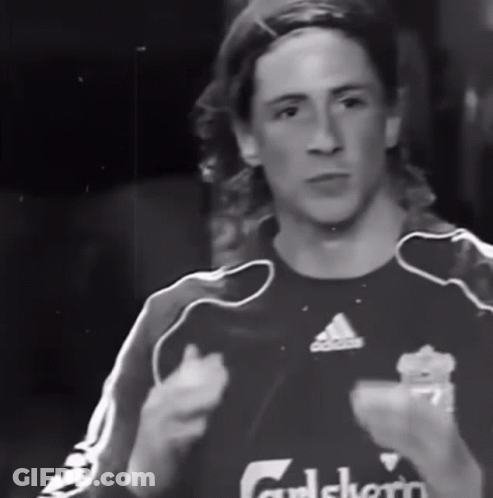 A Black And White Photo Of A Man Wearing An Adidas Jersey GIF