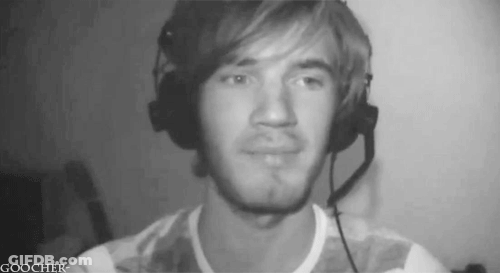 A Black And White Photo Of A Man Wearing Headphones And A Goocher Logo GIF
