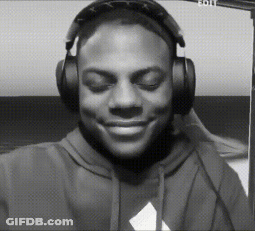 A Black And White Photo Of A Man Wearing Headphones With The Word Edit Visible In The Corner GIF