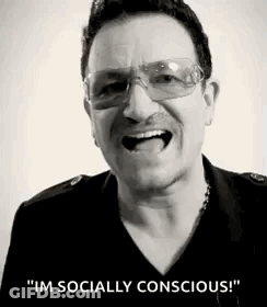 A Black And White Photo Of A Man Wearing Sunglasses . GIF