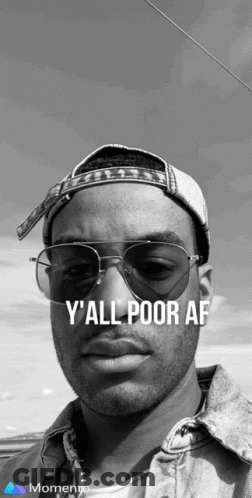A Black And White Photo Of A Man Wearing Sunglasses And A Hat That Says Y All Poor Af GIF