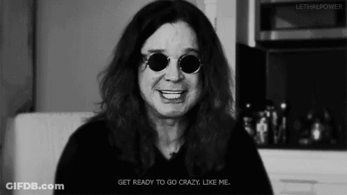A Black And White Photo Of A Man Wearing Sunglasses GIF