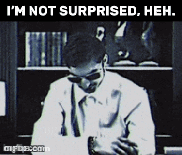 A Black And White Photo Of A Man Wearing Sunglasses With The Caption " I 'M Not Surprised , Heh " GIF