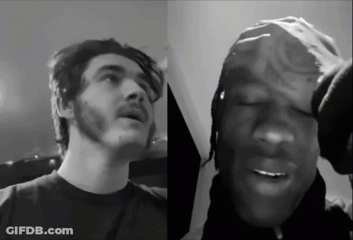 A Black And White Photo Of A Man With A Beard GIF