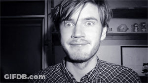 A Black And White Photo Of A Man With A Beard GIF