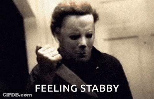 A Black And White Photo Of A Man With A Mask And The Words Feeling Stabby GIF