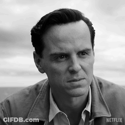A Black And White Photo Of A Man With A Netflix Logo On The Bottom GIF