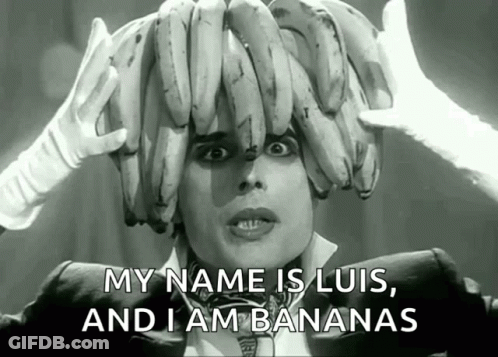 A Black And White Photo Of A Man With Bananas On His Head And The Caption My Name Is Luis And I Am Bananas GIF