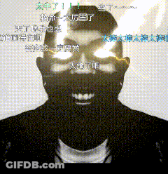 A Black And White Photo Of A Man With Chinese Writing Around His Head GIF