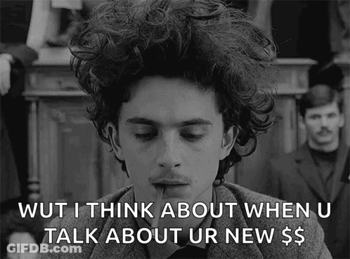 A Black And White Photo Of A Man With Curly Hair Saying Wut I Think About When U Talk About Ur New $ GIF