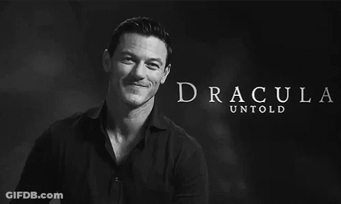 A Black And White Photo Of A Man With Dracula Untold Written In White Letters GIF
