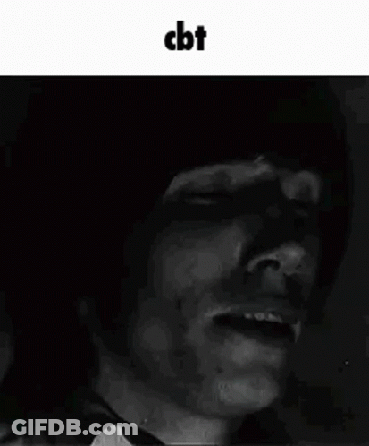 A Black And White Photo Of A Man With His Eyes Closed And A Shadow On His Face . GIF
