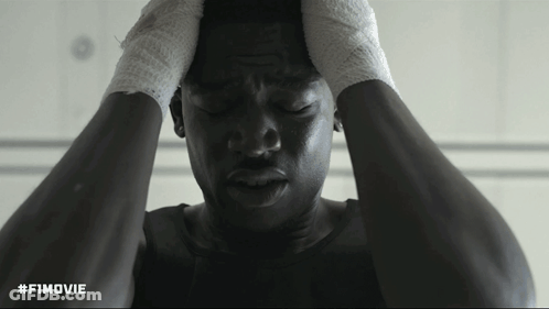 A Black And White Photo Of A Man With His Hands On His Head With The Hashtag #Fimovie GIF