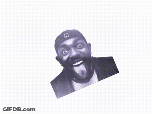 A Black And White Photo Of A Man With His Tongue Out GIF