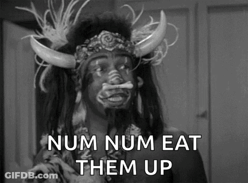 A Black And White Photo Of A Man With Horns And The Words Num Num Eat Them Up On The Bottom GIF
