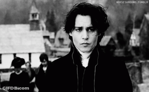 A Black And White Photo Of A Man With Horses Around Tumblr Written Below Him GIF
