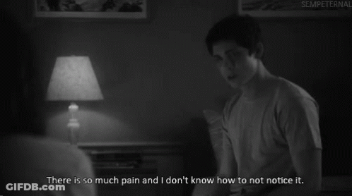 A Black And White Photo Of A Man With The Caption " There Is So Much Pain And I Don T Know How To Not Notice It GIF