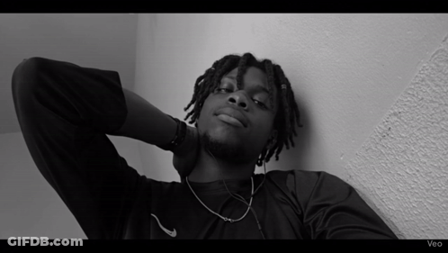 A Black And White Photo Of A Man With The Word Veo On The Bottom GIF