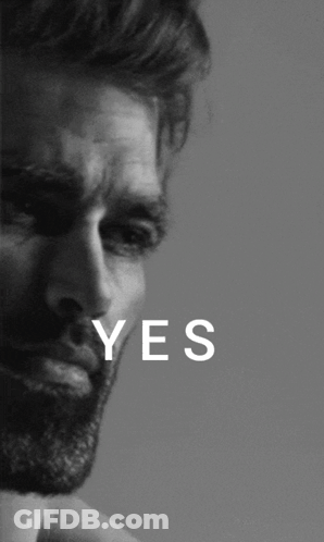 A Black And White Photo Of A Man With The Word Yes Written On It GIF