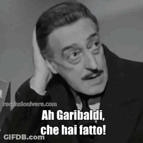 A Black And White Photo Of A Man With The Words Ah Garibaldi Che Hai Fatto On The Bottom GIF
