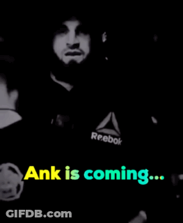 A Black And White Photo Of A Man With The Words " Ank Is Coming " GIF