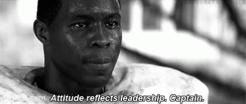 A Black And White Photo Of A Man With The Words `` Attitude Reflects Leadership , Captain '' . GIF