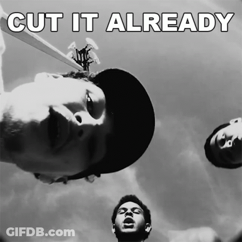 A Black And White Photo Of A Man With The Words Cut It Already Above Him GIF