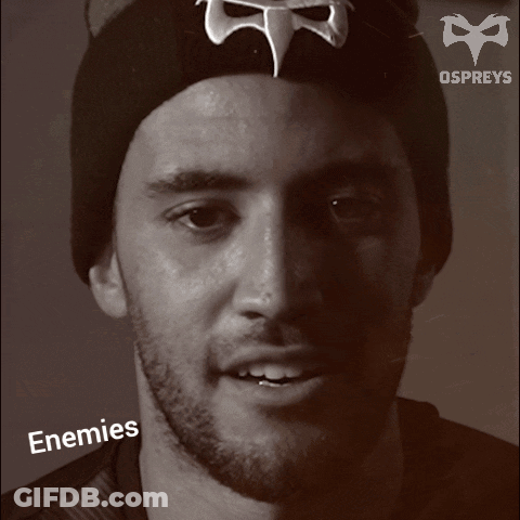 A Black And White Photo Of A Man With The Words Enemies On The Bottom Right GIF