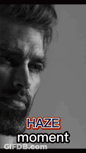 A Black And White Photo Of A Man With The Words Haze Moment On The Bottom GIF