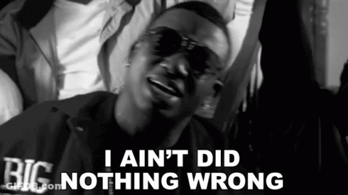 A Black And White Photo Of A Man With The Words I Ain 'T Did Nothing Wrong GIF