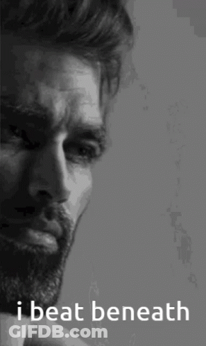 A Black And White Photo Of A Man With The Words I Beat Beneath GIF