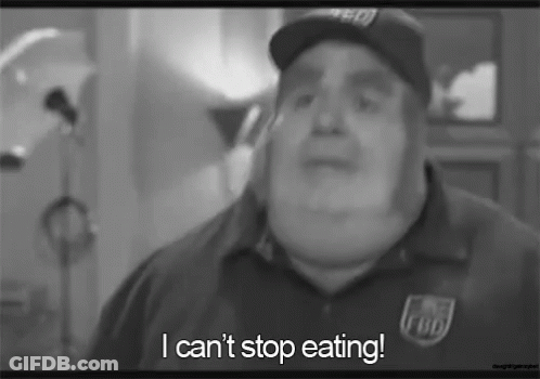 A Black And White Photo Of A Man With The Words I Can 'T Stop Eating GIF