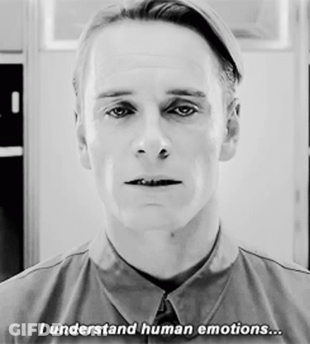A Black And White Photo Of A Man With The Words I Understand Human Emotions GIF