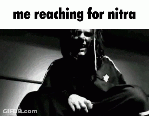 A Black And White Photo Of A Man With The Words " Me Reaching For Nitra " On The Bottom GIF