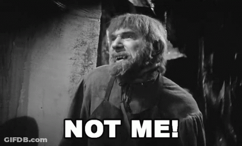 A Black And White Photo Of A Man With The Words " Not Me " On The Bottom GIF