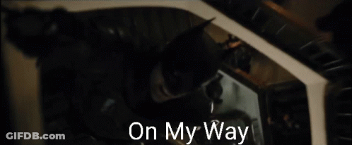 A Black And White Photo Of A Man With The Words On My Way Below Him GIF