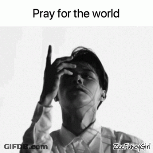 A Black And White Photo Of A Man With The Words Pray For The World GIF