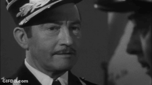 A Black And White Photo Of A Man With The Words Round Up The Usual Suspects On The Bottom GIF