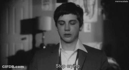 A Black And White Photo Of A Man With The Words Stop Crying GIF