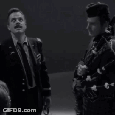 A Black And White Photo Of A Man With The Words We Are In Hell GIF