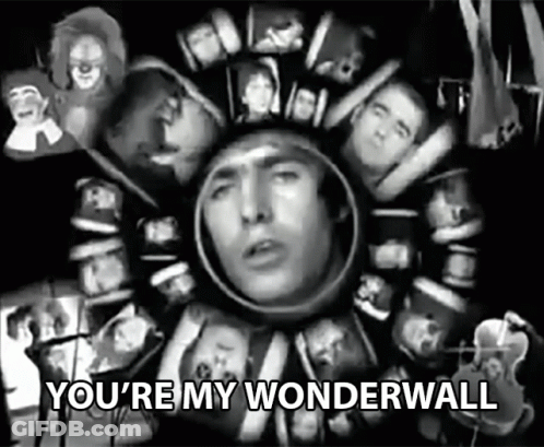 A Black And White Photo Of A Man With The Words " You 'Re My Wonderwall " At The Bottom GIF