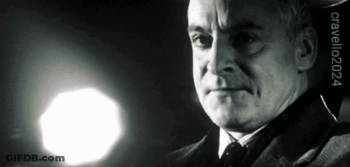 A Black And White Photo Of A Man With The Year 2004 On The Bottom Right GIF