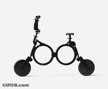 A Black And White Photo Of A Mechanical Device With A Wheel On A White Background . GIF